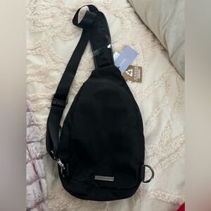 Cute cross body bag. Pays flat against your front to keep items safe and secure